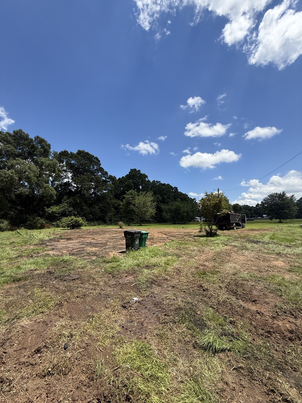 Graded field with equipment on site