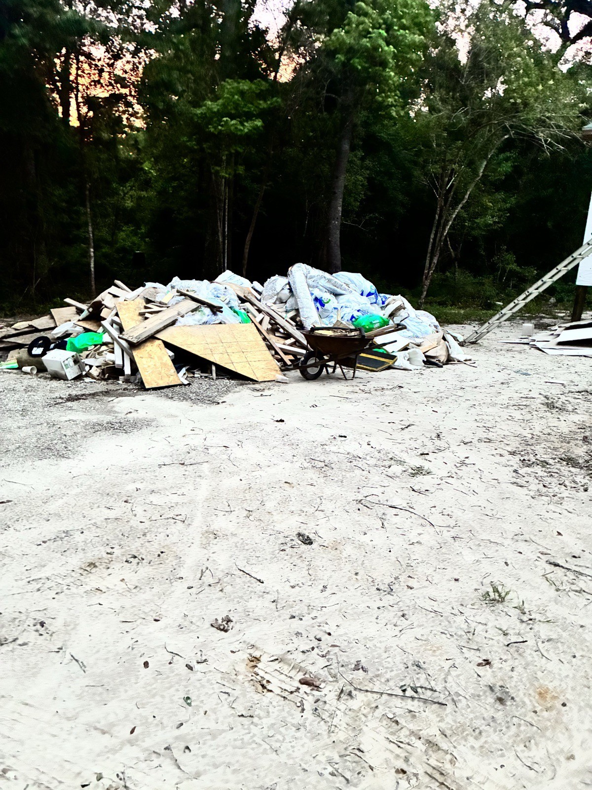 Construction debris staged for haul-off