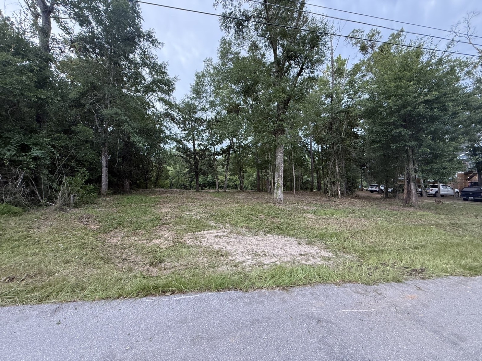 Cleared residential lot seen from the road